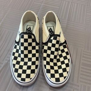 Checkered Vans slip ons